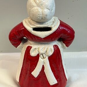 Charming Red and White Cast Iron Coin Bank Figurine